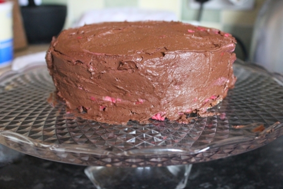 Frosted chocolate and raspberry cake